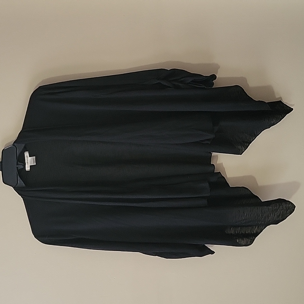 A medium black flowy cardigan from Self Esteem